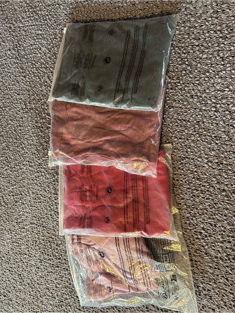 New -4 tshirts in Mauve, Rust, Red and Blush. Sz medium with rouching.